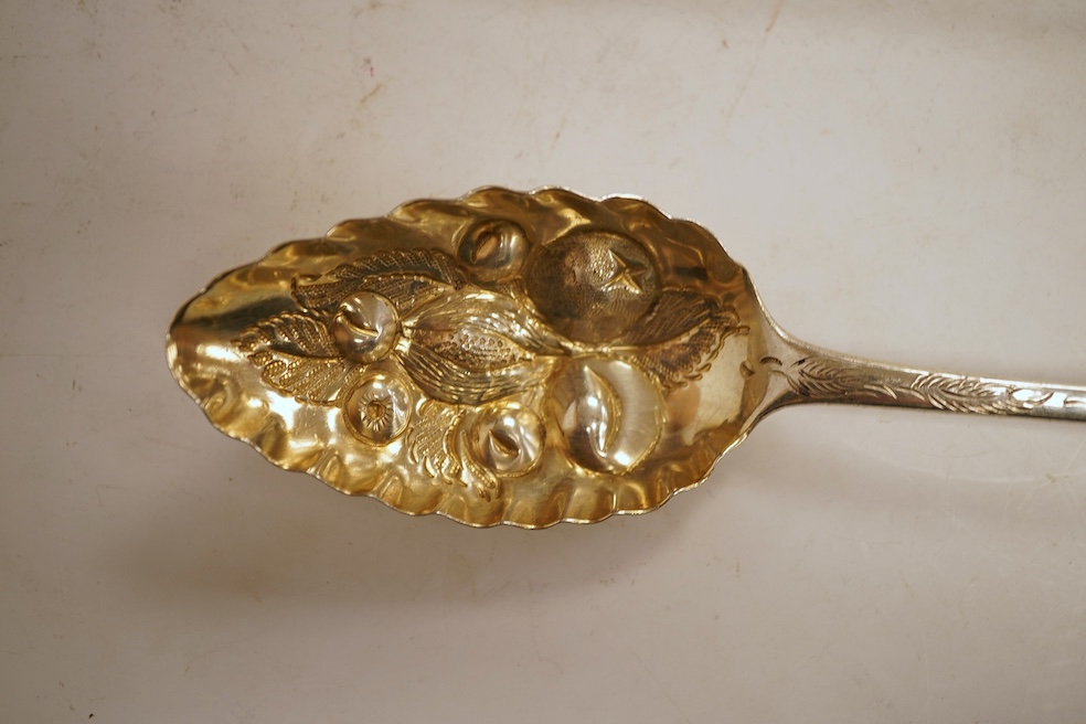 Three George III silver berry spoons, comprising a teaspoon and two Old English pattern tablespoons, one by Parsons & Goss, Exeter, 1807, 22.8cm, 4.2oz.